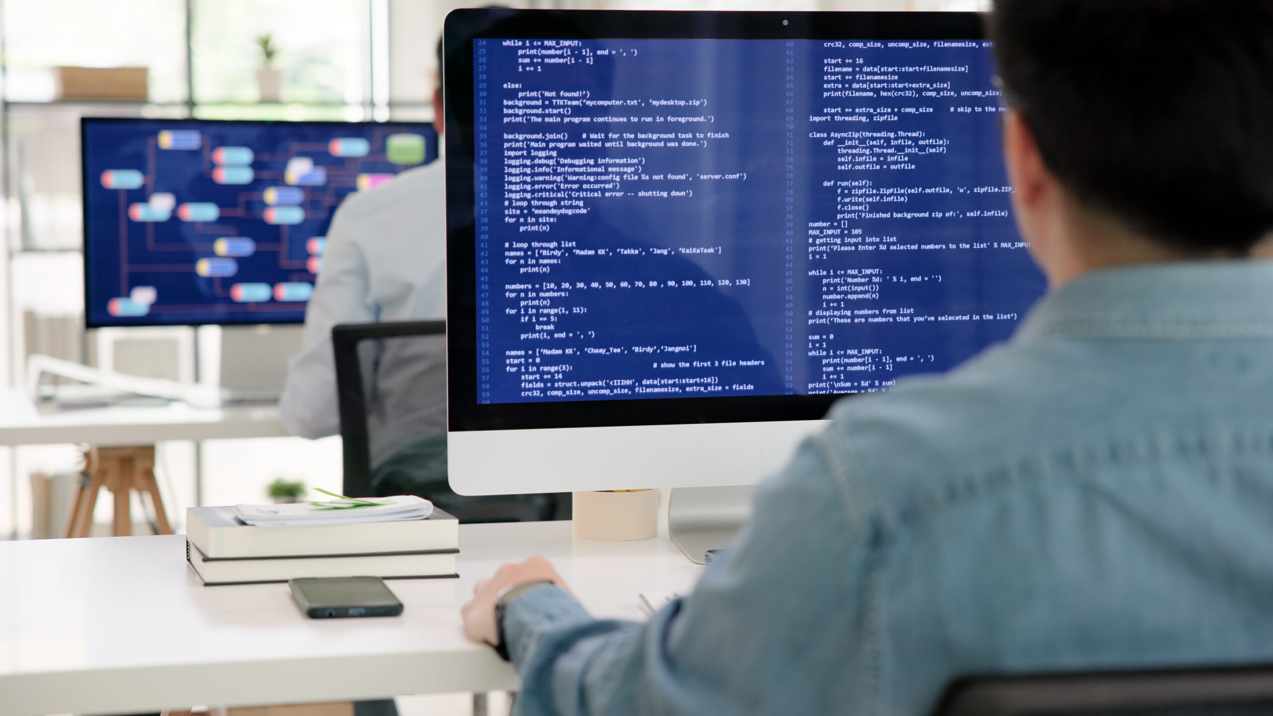 an IT expert working on his computer